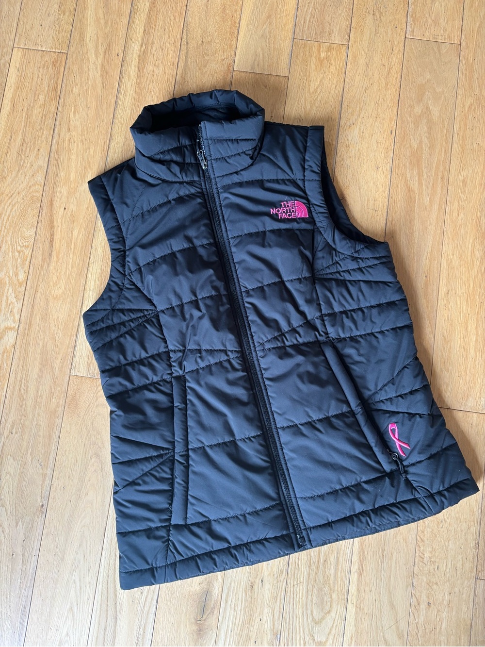 The North Face Black Quilted Vest with Pink Logo